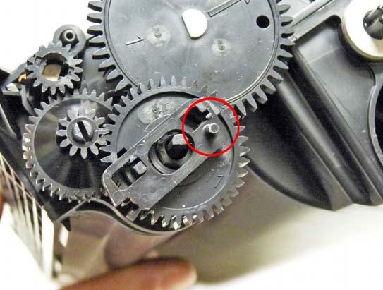 46. The small arrow on the white gear should face straight across the cartridge