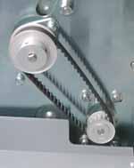 Remove the belt from the Bag Drive Roller (larger) pulley. Loosen the 2 set screws and remove the pulley. (figure 7) 5.