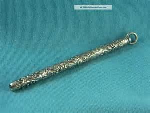 Late 1800's Sterling Silver twist pencil with snail pattern. Has a few character dents at front end.