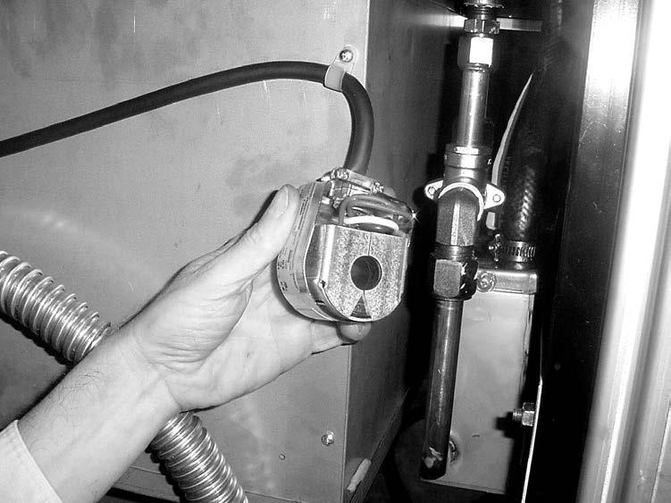 If this valve should become dirty, or the Teflon seat nicked, pressure will not build up. The electric fryer uses a 208/240 volt 60 hertz coil (50 hertz internationally).