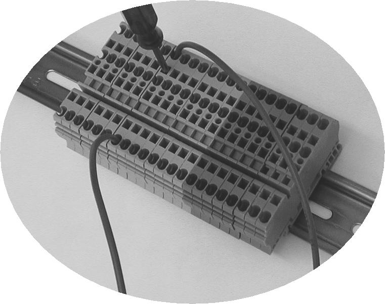 Figure 23 Connect the wires within the mini-panel to the appropriate terminals.