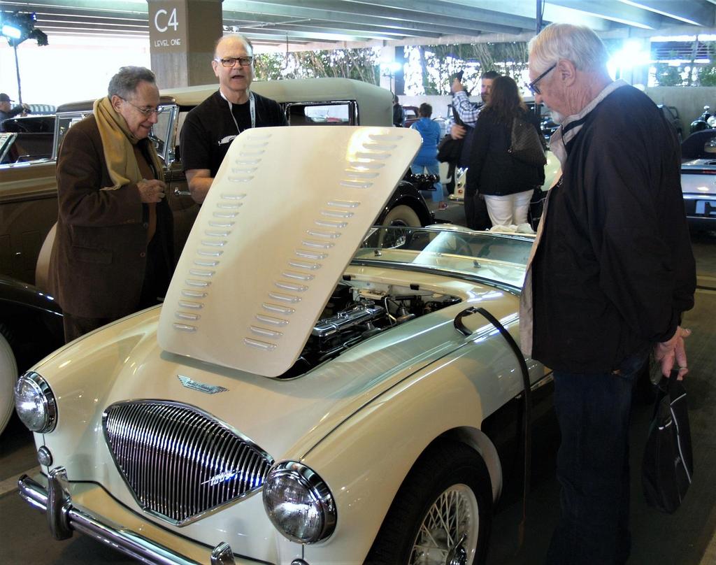 1956 Austin-Healey 100 M 'Le Mans' sold for $165,000 There s that guy again on the right. Is that Wayne Carini? No, too tall.