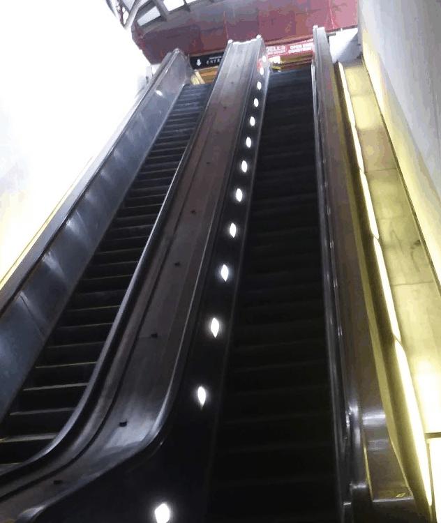 Getting to the Fashion Centre Mall from the Bus Stop at Hayes St & 12 th St: Escalator from