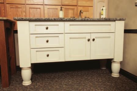 This Spa Vanity was created with StarMark s Waterfall door style in Maple finished in Macadamia with ronze glaze.