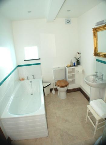 Bathrooms all have level access from the bedrooms and passageways door opening width is 28 inches 710 mm The