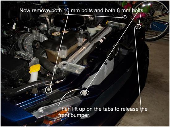 Next you will remove two 10mm bolts and two 8 mm bolts as shown in the picture below.