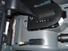 There are 4 bolts that hold the console in place; two