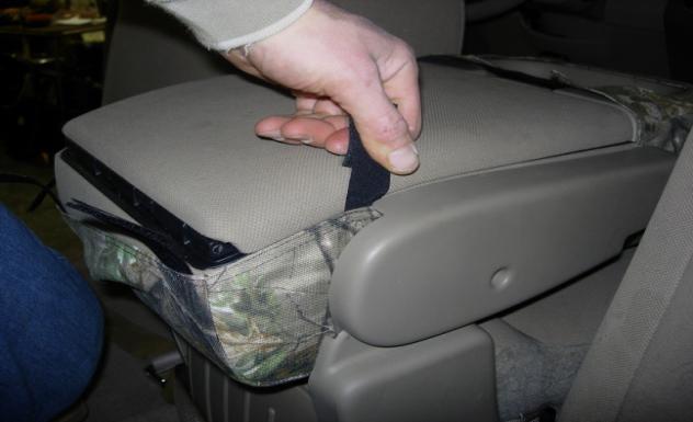 seat, forming the seat cover around the back corner of the seat. Tuck the other side in and mate it to the carpet.