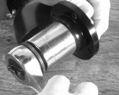 Tighten the nut for more tension using either an open ended or socket wrench, 1¼".