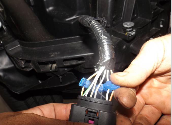C. Wire into OEM electrical harness and headlight wiring using supplied tap connectors for fog and turn signal.