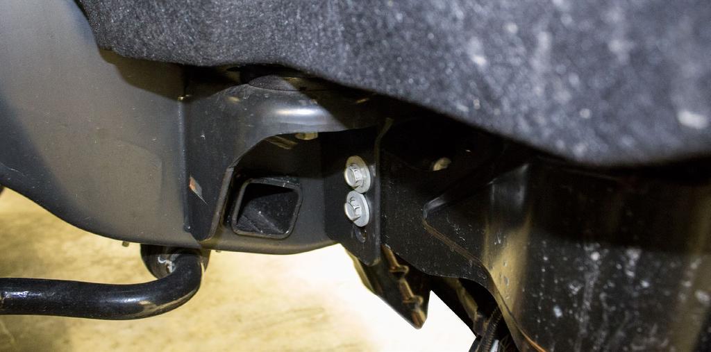 2. Use a 15mm Socket to remove the two bolts (per side) that secure the OEM bumper side supports.