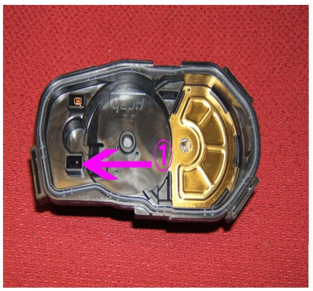 13. Verify that the TP sensor cover gasket HAS REMAINED in the TP sensor cover as shown.