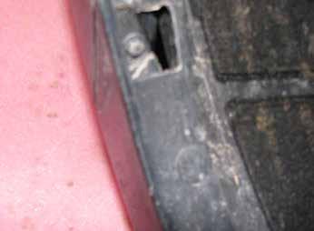 Using a T20 Torx remove the four screws from under the center front of the