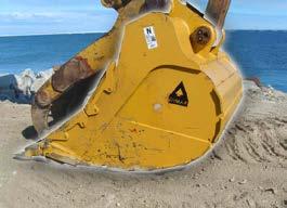 Dymax Heavy Duty Rock Buckets are available in a spade edge or straight edge model. Optional lip shrouds, side shrouds and custom armor plating is available if specified.