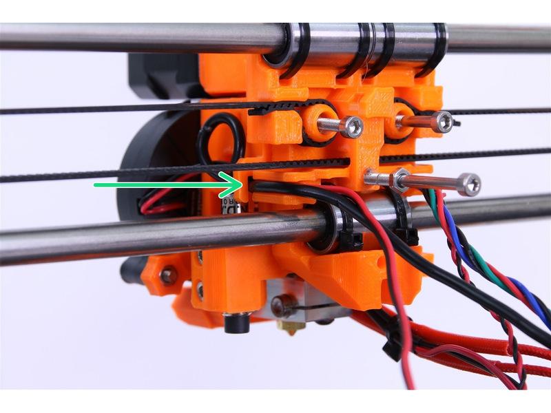 Make sure the cables from the extruder motor are guided