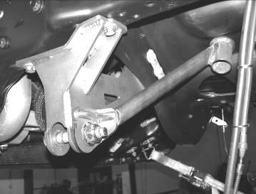 Do not push the bolt fully through at this time. 30. Locate FT30273 trac bar support bracket.