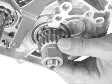 Hook Shim ring Install primary drive gear.