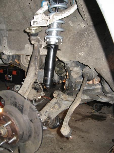So jack up one side of the car at a time, do not try to do both sides at once. Disconnect the upper control arm, lower ball joint, and steering tie rod end.