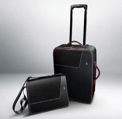 ALL MODELS GENUINE LUGGAGE SET IN CARBON FIBRE WITH RED DETAILS The Genuine programme offers a range of products conceived and created by Poltrana Frau specifically for Ferrari and consisting of