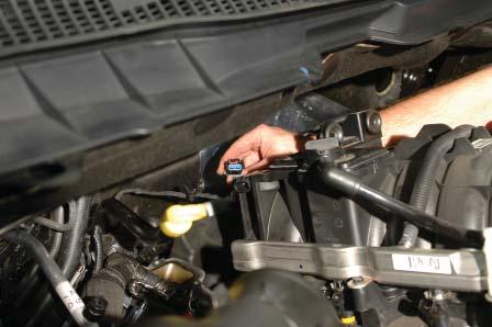 Remove the OEM intake manifold assembly from the vehicle.