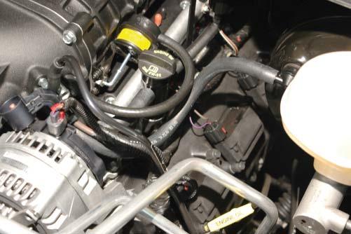 Attach a piece of the OEM hose between the brake booster valve and the
