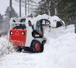 snow off-site 6 motor graders to clear snow beneath freight trailers.