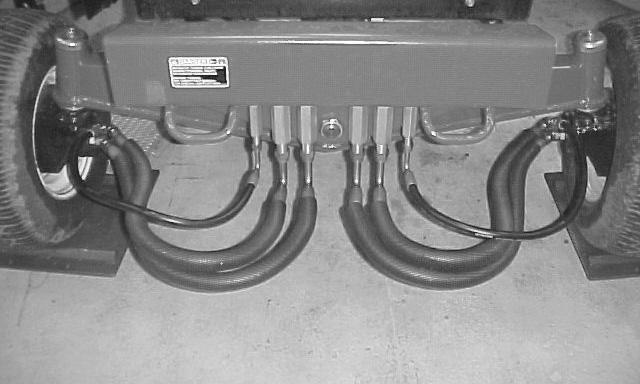 . Using the bulkhead assembly as a template, locate, mark, and drill two 5/ holes. Secure the bulkhead assembly to the rear bumper with two /8 6 x lg. screws and /8 6 locknuts (Fig. 5).