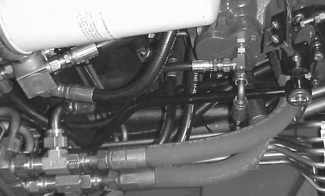 6.75 To ease assembly of fittings and hoses, connect hoses to tee fittings before installing tee fittings. Figure 8. Block bracket. Control block m 459. Tee fitting. Pressure line Figure 0.
