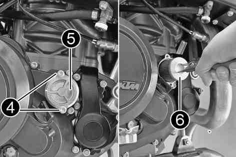 Place a suitable container under the engine. Remove screws. Remove the oil filter cover with the O-ring. Pull oil filter out of the oil filter housing.