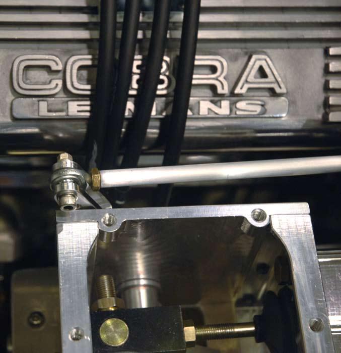 The clutch pedal is on the left and the brake pedal is on the right. The hollow cylinder at the top of the brake pedal is for the brake bias bar bearing.