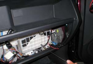6. Attach 12' harness to wire puller and pull through glove box opening