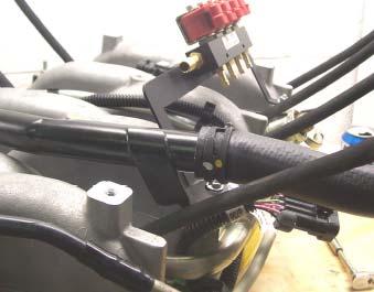 16. Reinstall the oil fill tube assembly onto the manifold utilizing the original mounting hardware. 17.
