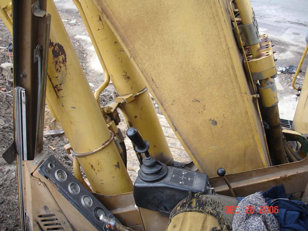 able to move the decedent s body from the lever and was able to move the boom up. It is unknown if the excavator operator warned the decedent about standing on the tracks.