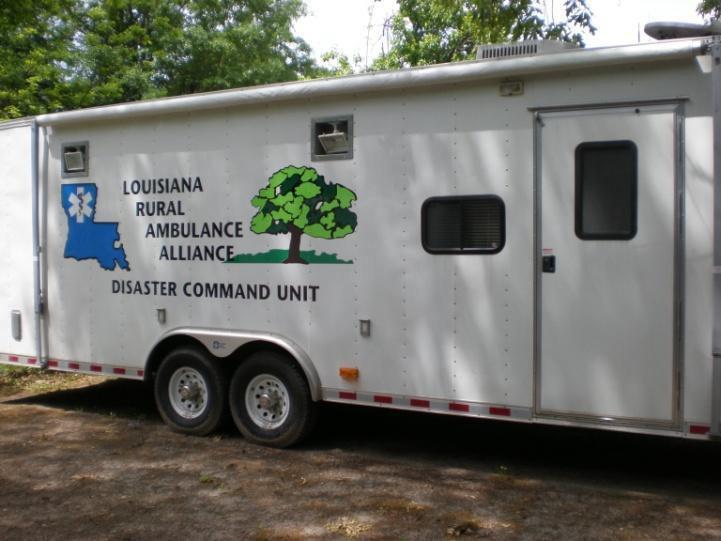 DCU-R7 TRA-1 TRAILER, 28 FT DISASTER COMMAND 2005 Pace Cargo/Command 28' Bumper Pull Trailer, Model: Pace PR8528TA4 4 twin beds hang from walls of trailer, kitchenette and small bathroom.