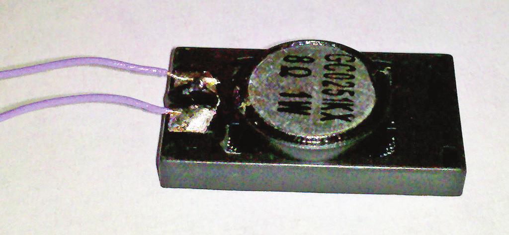 Attach the motor leads to the M+ and M- terminals (tabs 5 and 6) on the decoder. (Photo 11) Photo 11 13.