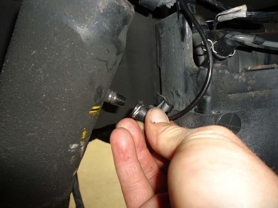 3. LOCATE AND REMOVE THE AIR LINE TO DEFLATE THE AIR SHOCK.