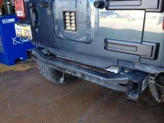 RIGID SERIES REAR BUMPER INSTALLATION 1. Remove stock bumper and set aside all of the hardware. a. The frame side (4) and tire carrier (8) bolts will be REUSED b.