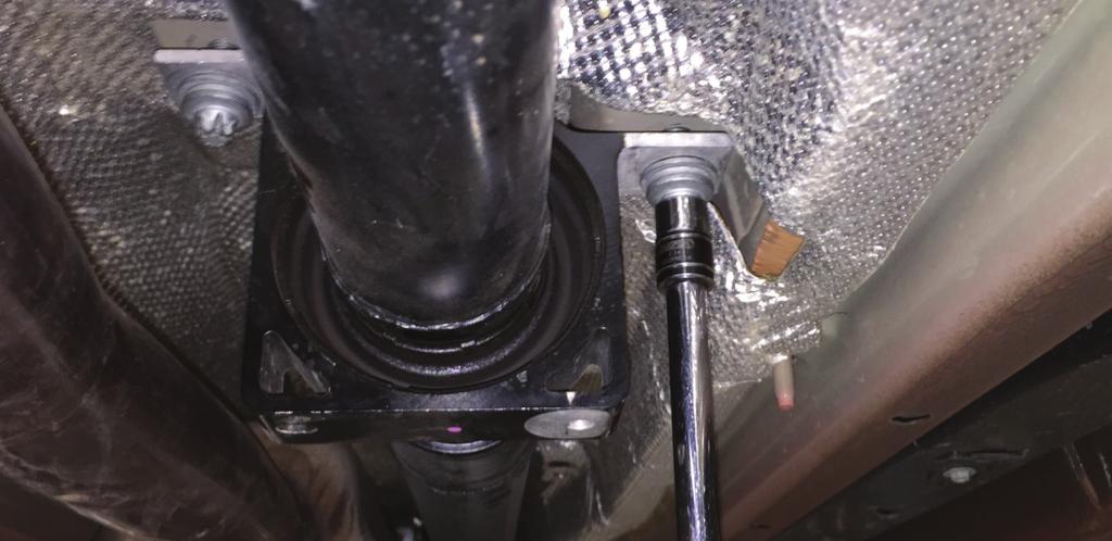 30. Loosen the carrier bearing bolts. This will require a E-12 reverse Torx socket (Figure: 13). Figure: 13 31.