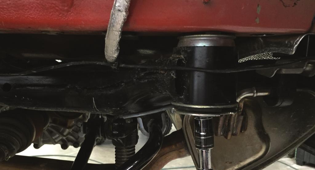 41. Remove the inner fender from the Passenger s side of the Jeep. 42. Place the floor jack under the rear differential, and provide some slight pressure.