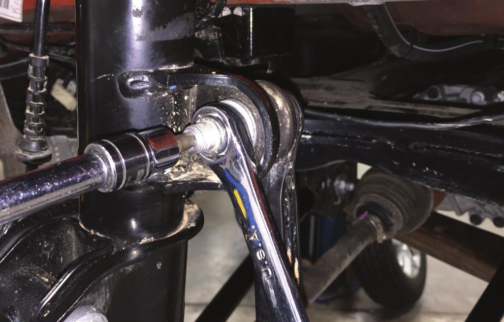 Figure: 27 53. Disconnect the sway bar end link from the body of the strut. A T-40 Torx and 18mm open end will be needed (Figure 28).