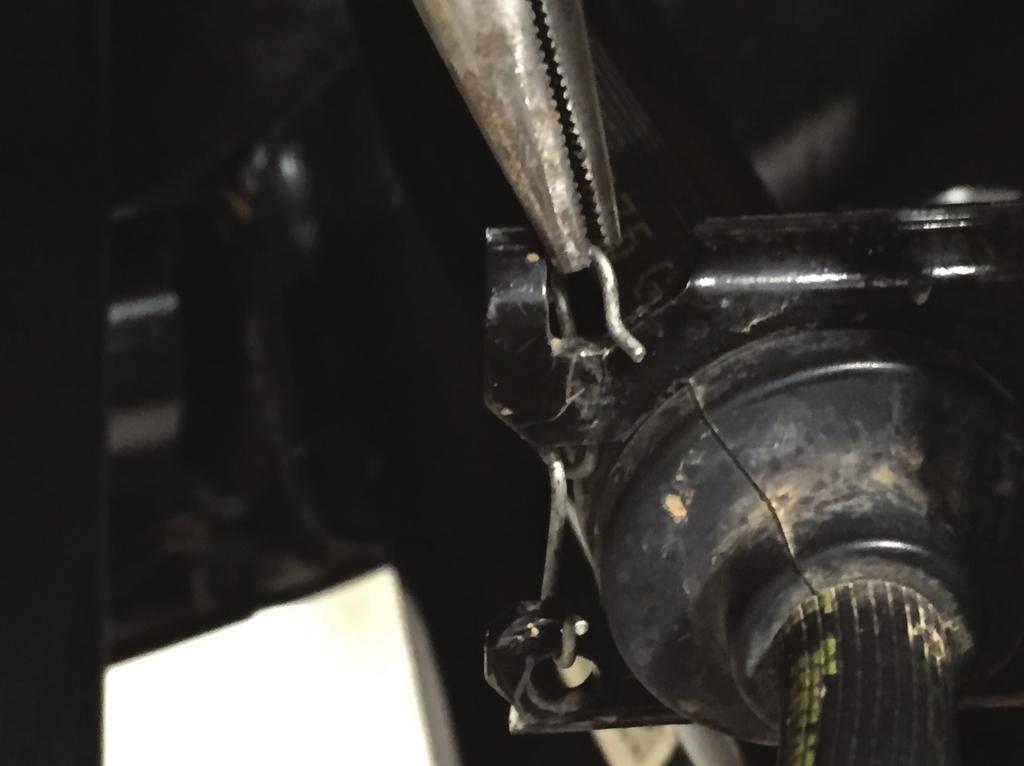 Once the retaining nut is loosened strike the steering knuckle with the hammer until the tie rod