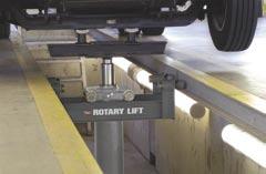 A suspended pit lift rides on a rail at the floor grade area and needs specific structural requirements to safely use the product.