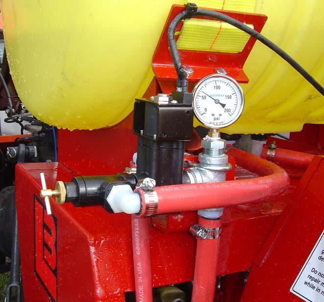 Pressure gauge FLOW CONTROL VALVE Spraying Adjustment To adjust sprayer Follow these steps: FIGURE 9 1. Prime pump with all valves open. 2.