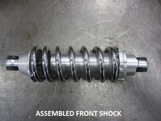9) Assemble and install the front coil over shocks using ½ 13 x 2 ½ hex