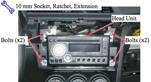 24. Using a 10mm wrench, remove the 4 bolts that hold the radio head unit in place.