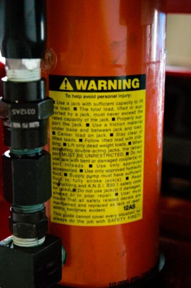 Illustrated to the right: A warning label outlining some of the important safety information in