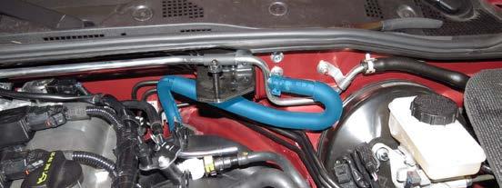 29. Using hose clamp pliers, remove the brake booster hose from the