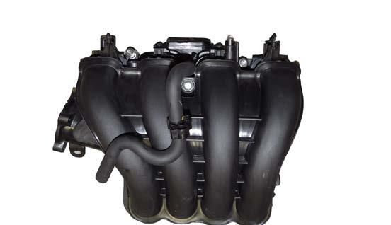 Carefully move the engine harness away from the intake manifold to gain access to