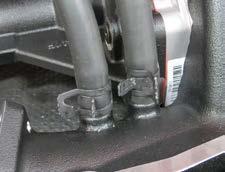NOTE: The bracket should be rotated toward the alternator so to rests against the