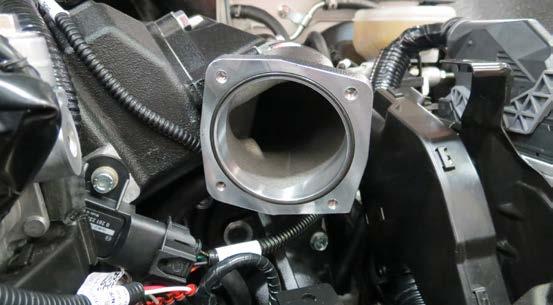 Locate the 2 section of hose previously attached to the supercharger inlet during